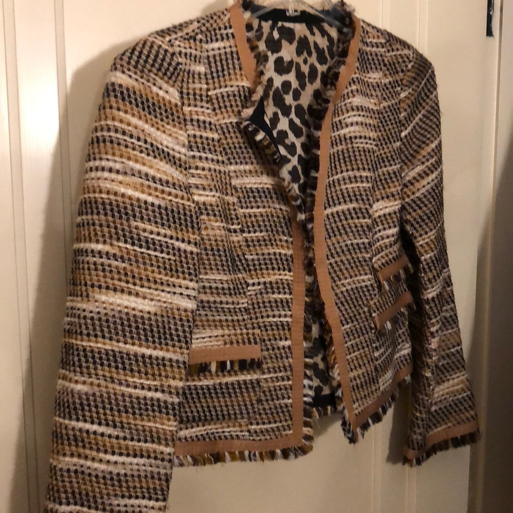 Reversible channel style short jacket.